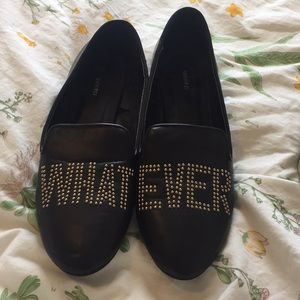 Black “whatever” loafer flats
